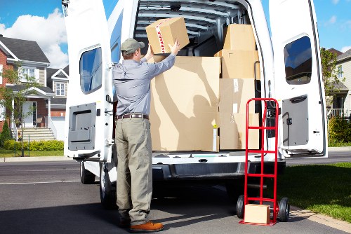 Local movers handling furniture for a small removals job in Kilburn