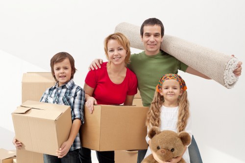 Packed moving boxes ready for a Kilburn man and van move