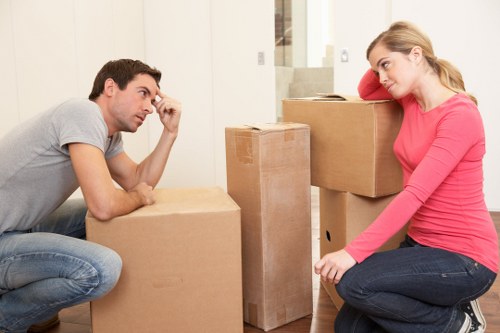 Carefully packed household boxes ready for a Kilburn move