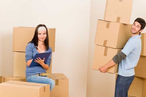 Careful wrapping of furniture during a Kilburn flat move